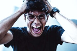 male in agony