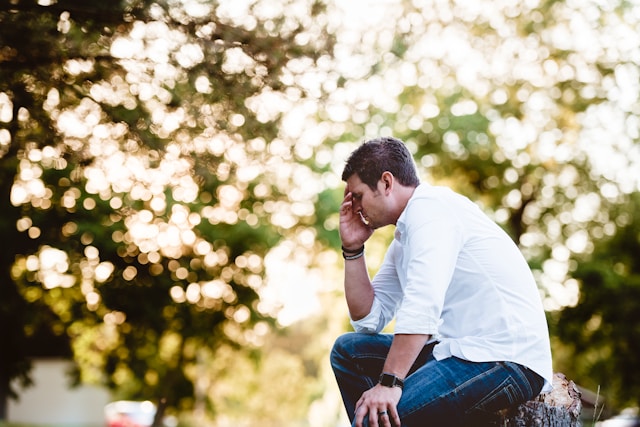 ben-white-7SRymDKKDus-unsplash depressed man in white